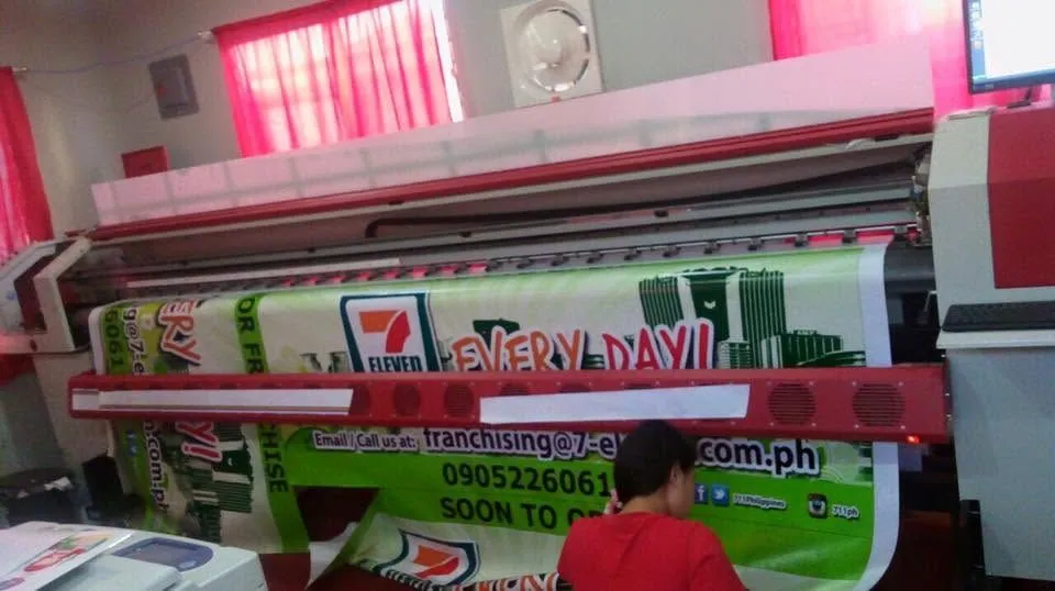 7-Eleven tarpaulin, fresh off MCAV's printer