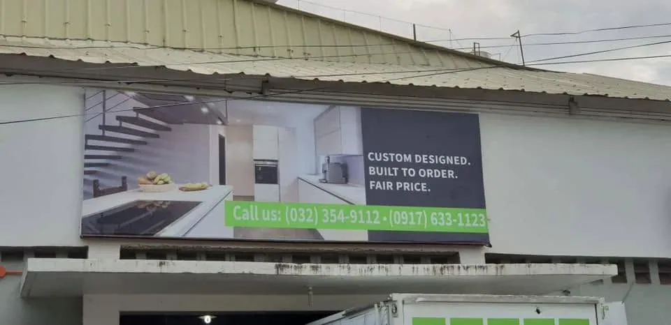Framed tarpaulin, printed and installed by MCAV