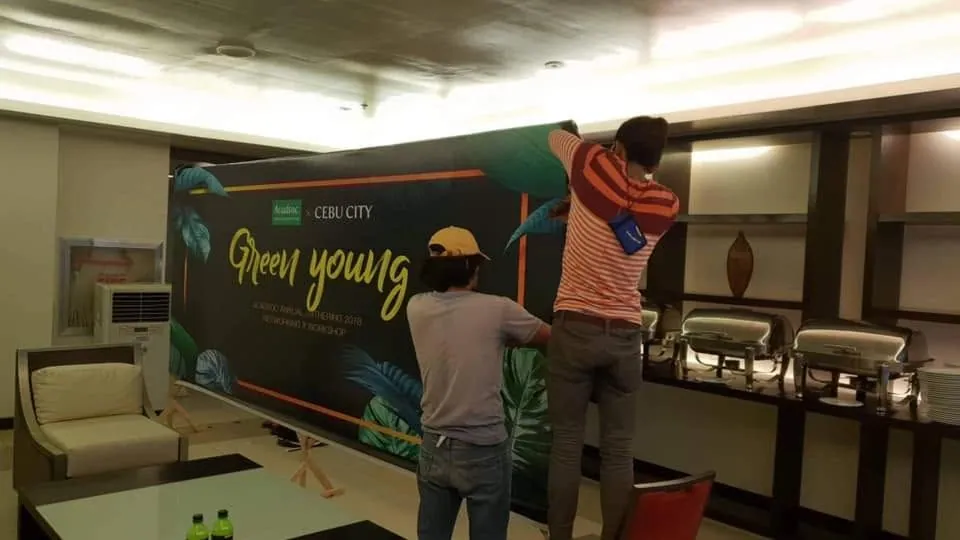 MCAV crew installing an Acadsoc framed tarpaulin