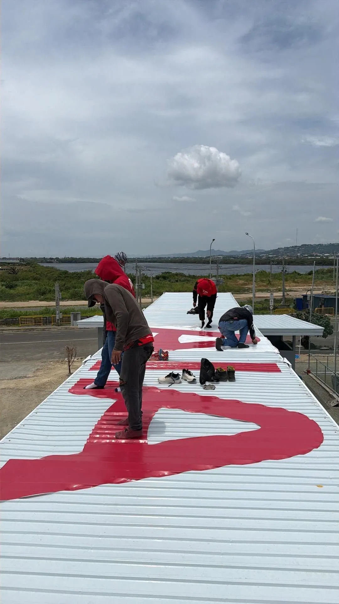 MCAV crew installing an AIA vinyl graphics