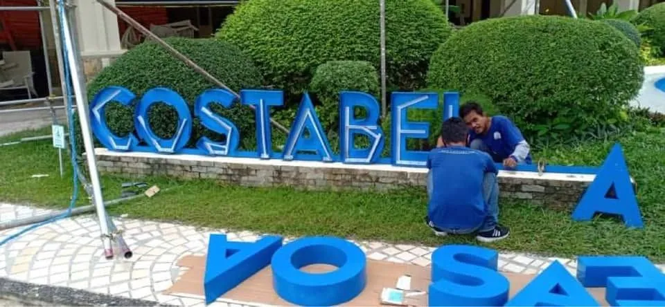 MCAV crew installing a Costabella aluminum built-up letters