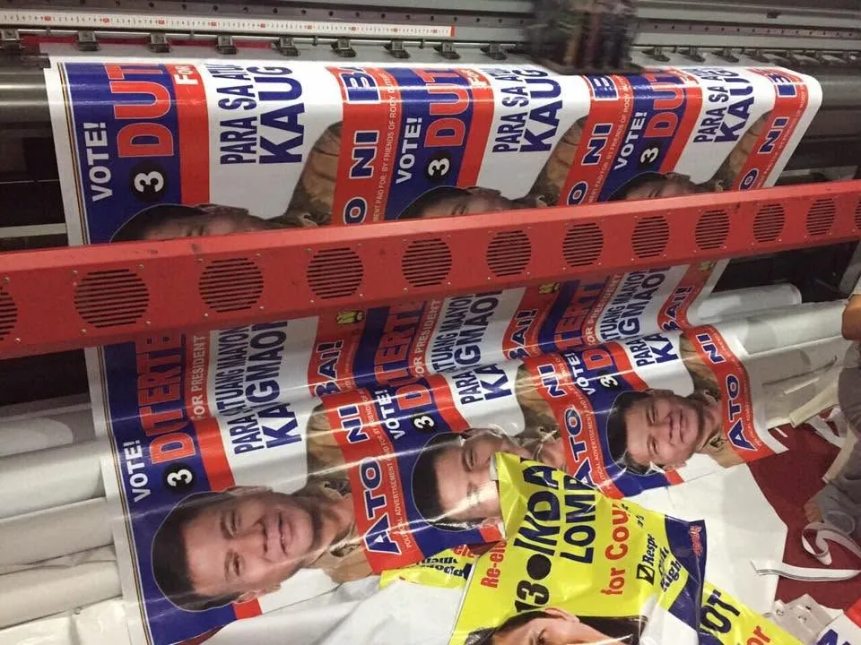 Election campaign tarpaulin, fresh off MCAV's printer