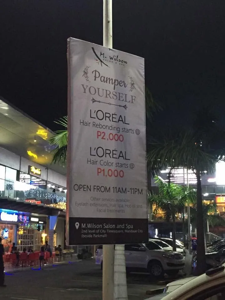 M. Wilson Salon and Spa framed tarpaulin at City Time Square, Mandaue City, printed and installed by MCAV