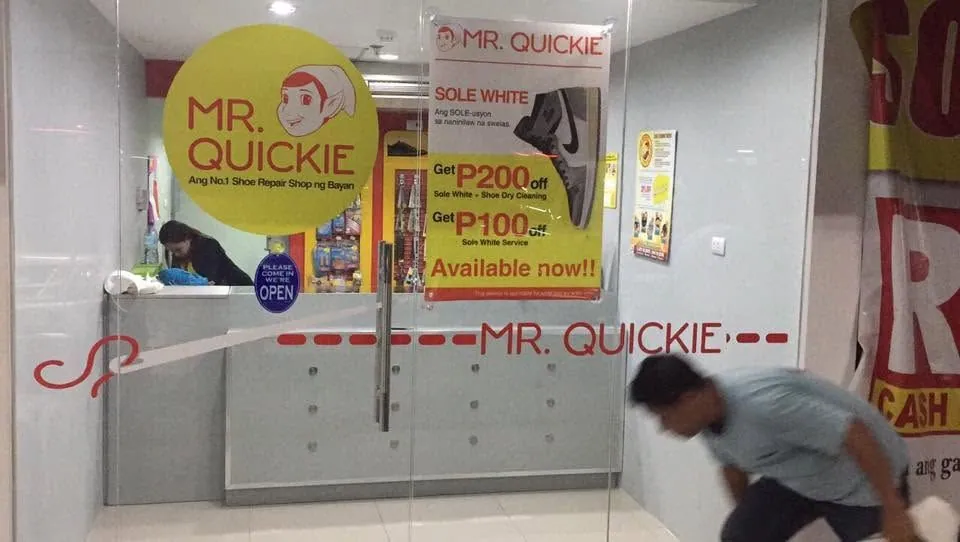 MCAV crew installing a Mr. Quickie vinyl graphics
