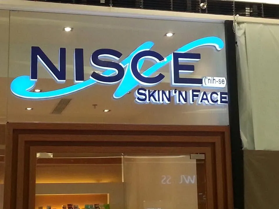 Nisce Skin 'N Face lighted sign, printed and installed by MCAV