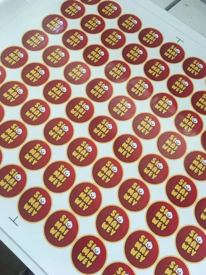 Si Mai Wey die-cut stickers, fresh off MCAV's printer