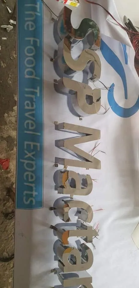 MCAV crew installing a SSP Mactan Cebu lighted sign