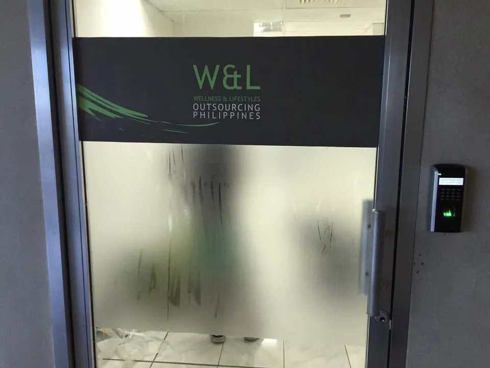 W&L Wellness & Lifestyles Outsourcing Philippines vinyl graphics, printed and installed by MCAV