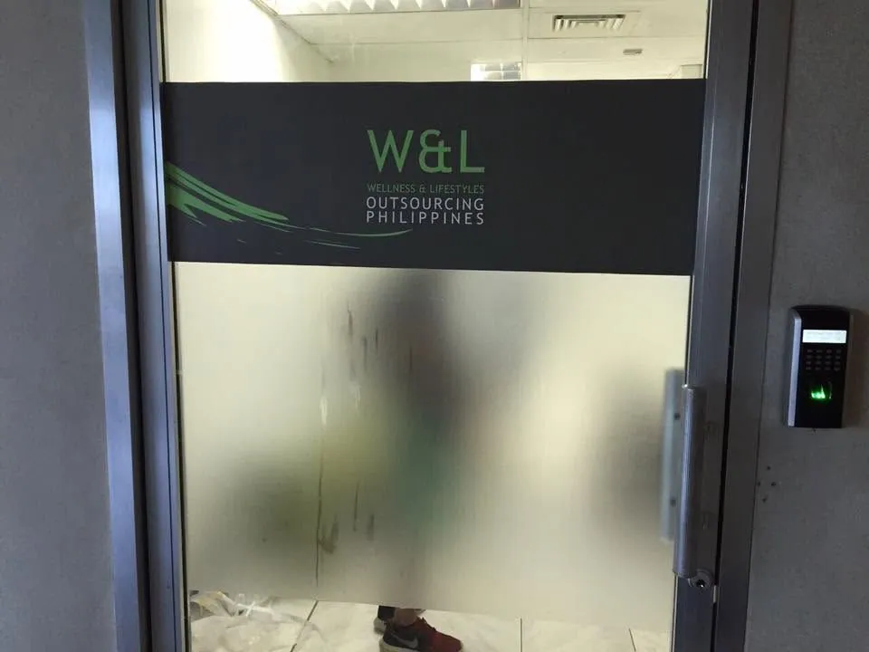 W&L Wellness & Lifestyles Outsourcing Philippines vinyl graphics, printed and installed by MCAV