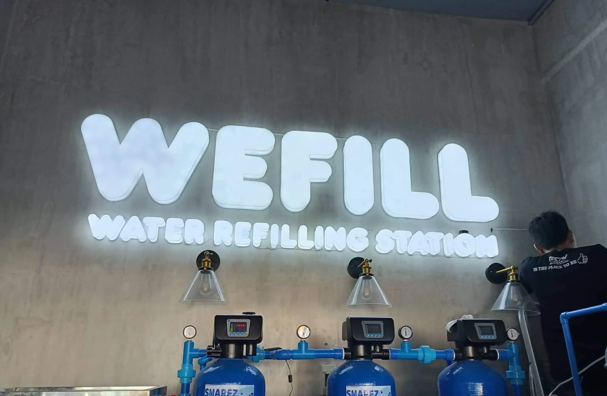 Wefill Water Refilling Station lighted sign, printed and installed by MCAV