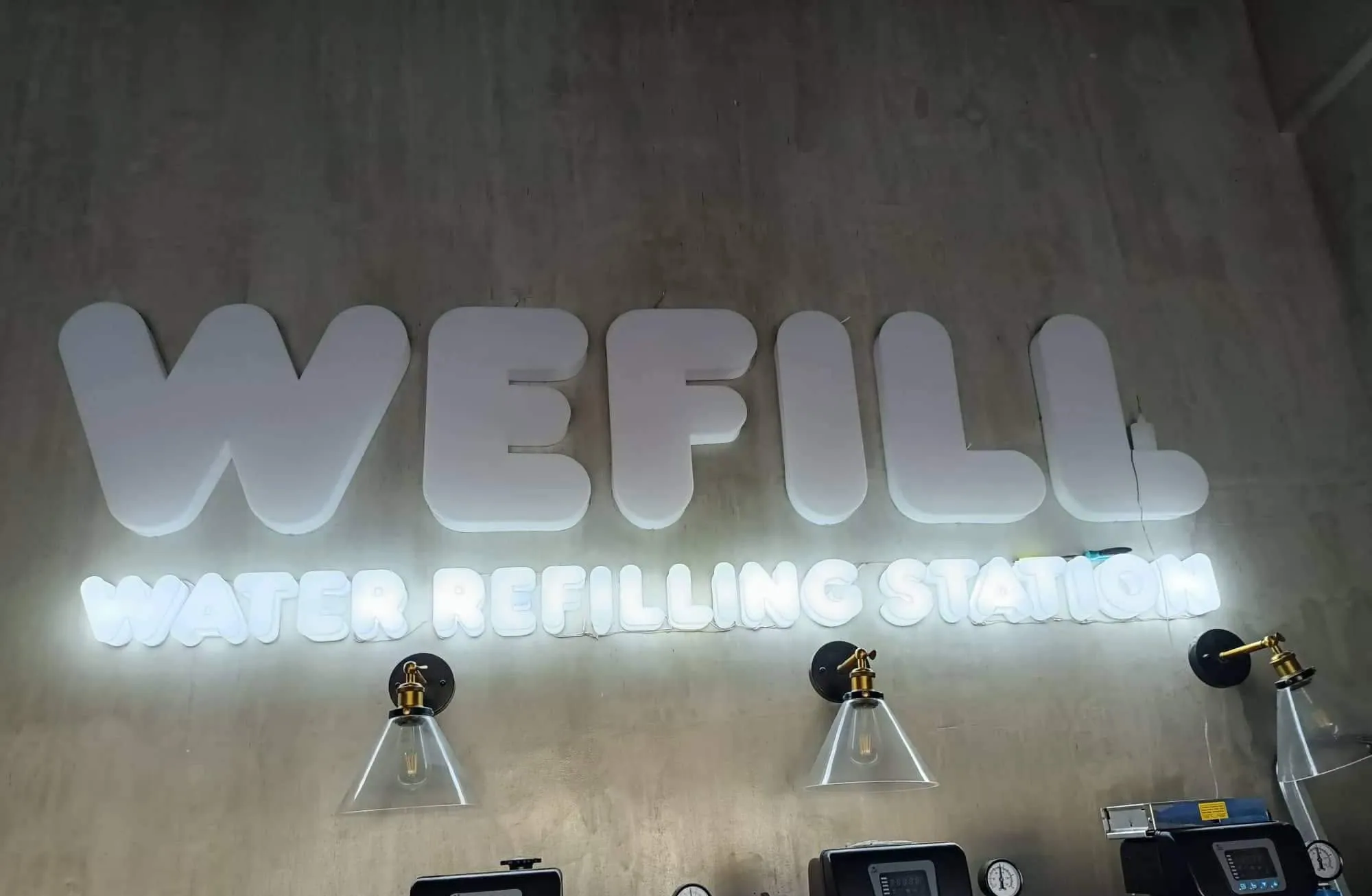 Wefill Water Refilling Station lighted sign, printed and installed by MCAV